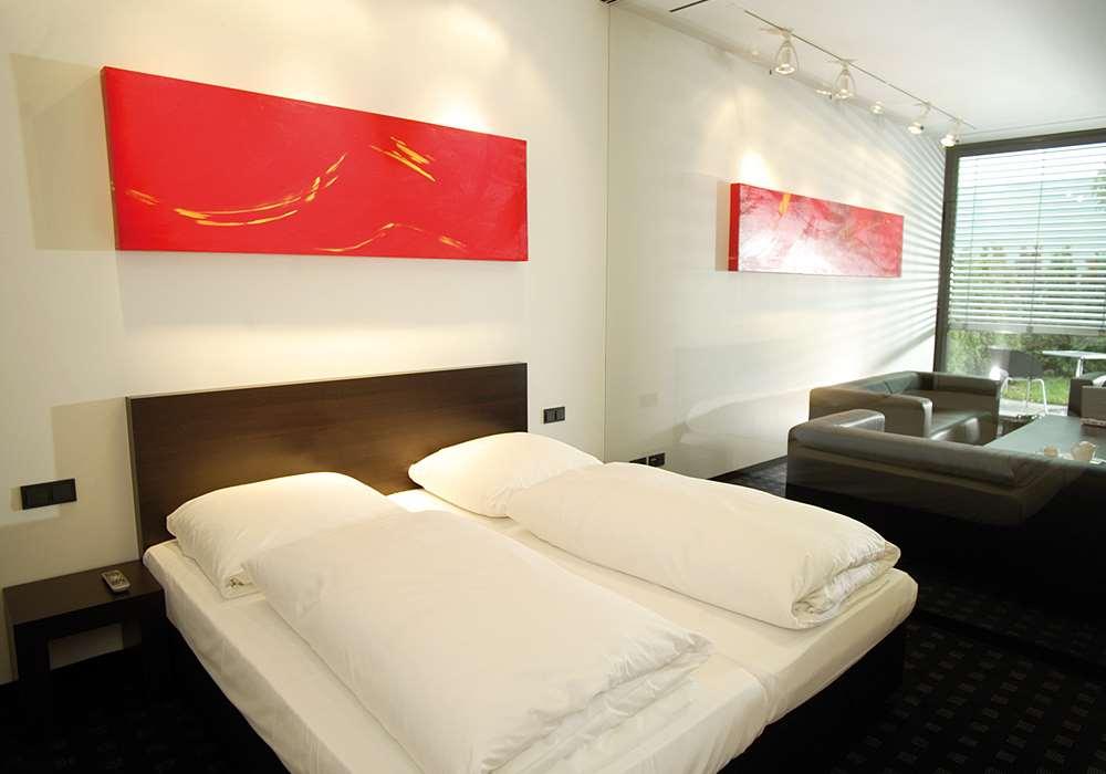 Ara Hotel Comfort Инголщат Стая снимка